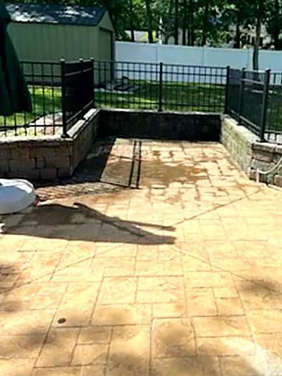 The empty patio where the hot tub used to be
