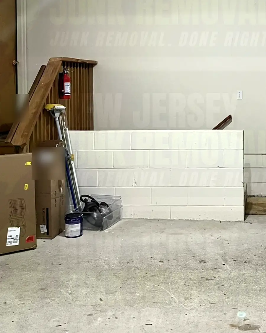 After: the same garage corner cleared and swept
