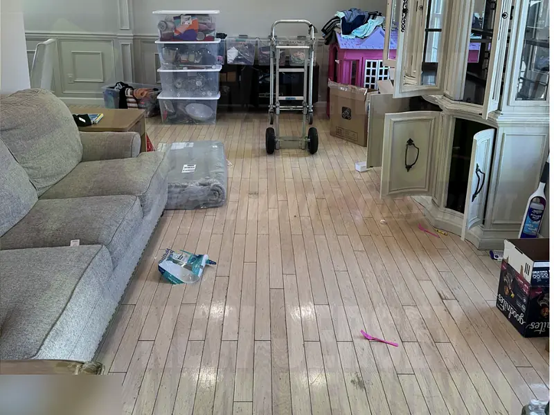 A china hutch and sofa waiting to be removed from a home